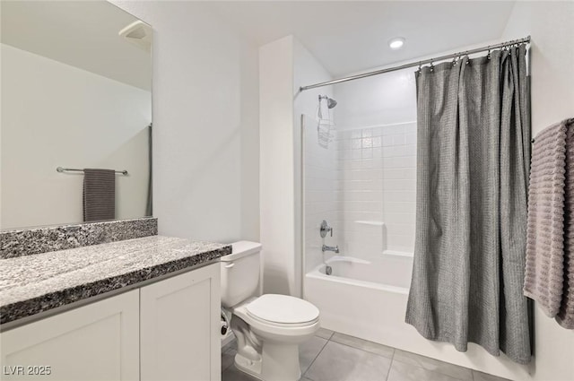 489 Filaree Pl, Henderson, NV 89015 - bathroom with tile patterned floors, shower / bath combo with shower curtain, vanity, and toilet