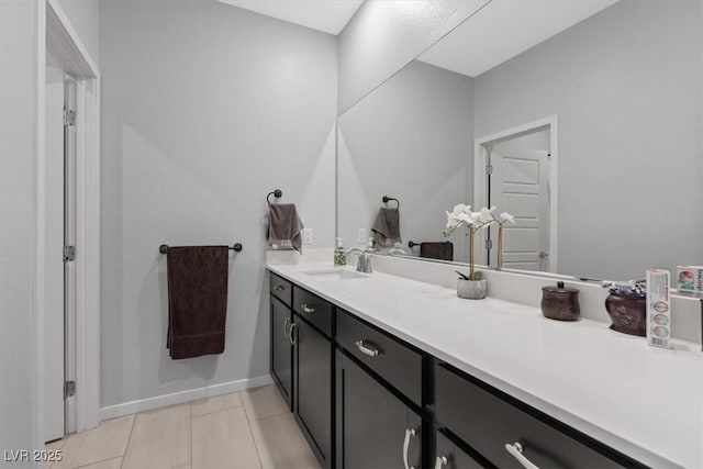 143 Aqua Commons Ln, Henderson, NV 89015 - bathroom featuring vanity, tile patterned flooring, and baseboards
