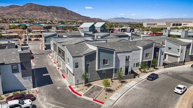 143 Aqua Commons Ln, Henderson, NV 89015 - aerial perspective of suburban area featuring a mountainous background