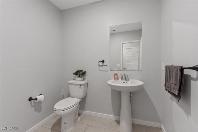 143 Aqua Commons Ln, Henderson, NV 89015 - half bath with toilet, tile patterned flooring, and baseboards