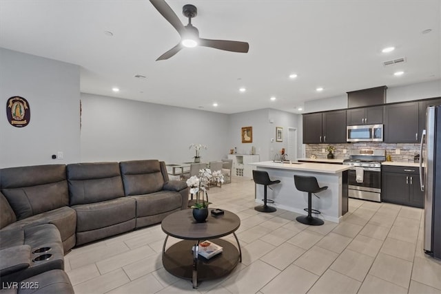 143 Aqua Commons Ln, Henderson, NV 89015 - living area with a ceiling fan, recessed lighting, and light tile patterned flooring