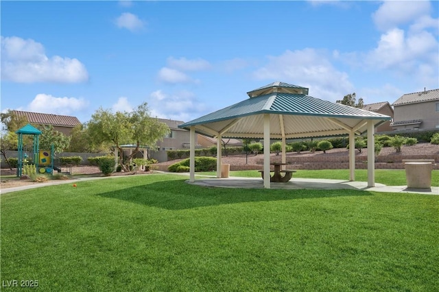 view of home's community featuring a gazebo, a lawn, and playground community