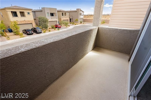 balcony featuring a residential view