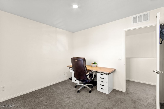 carpeted office featuring baseboards and visible vents