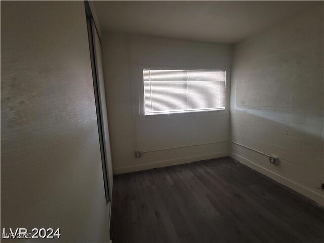 1317 Exley Ave, Las Vegas, NV 89104 - spare room with baseboards and dark wood finished floors