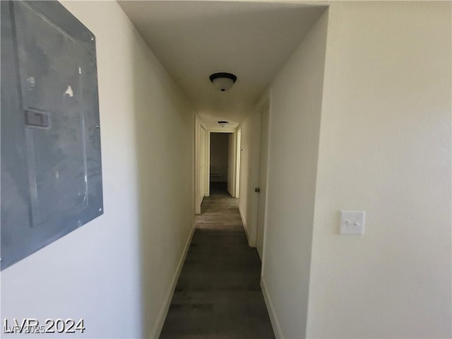 1317 Exley Ave, Las Vegas, NV 89104 - corridor with baseboards and dark wood finished floors