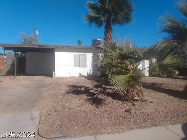 1317 Exley Ave, Las Vegas, NV 89104 - view of side of property with an attached carport