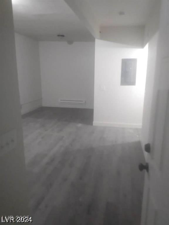 1317 Exley Ave, Las Vegas, NV 89104 - unfurnished room featuring baseboards and electric panel