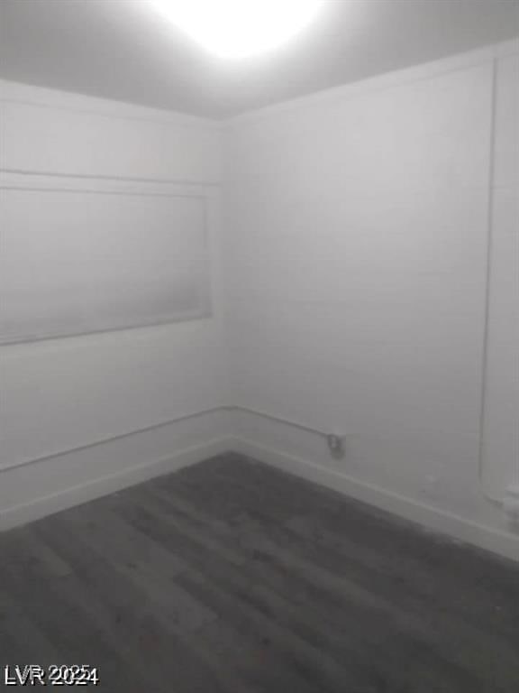 1317 Exley Ave, Las Vegas, NV 89104 - spare room with baseboards and wood finished floors