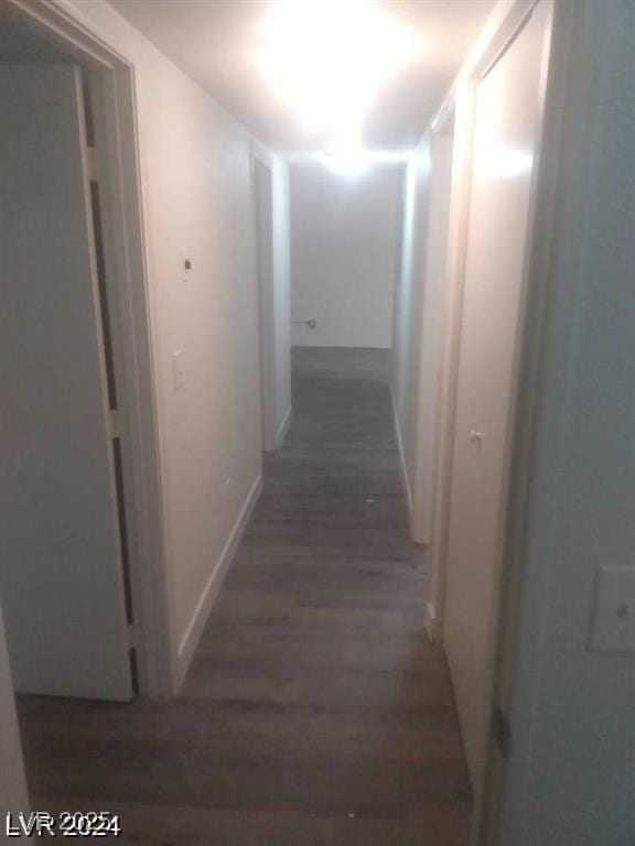 1317 Exley Ave, Las Vegas, NV 89104 - hallway featuring baseboards and wood finished floors