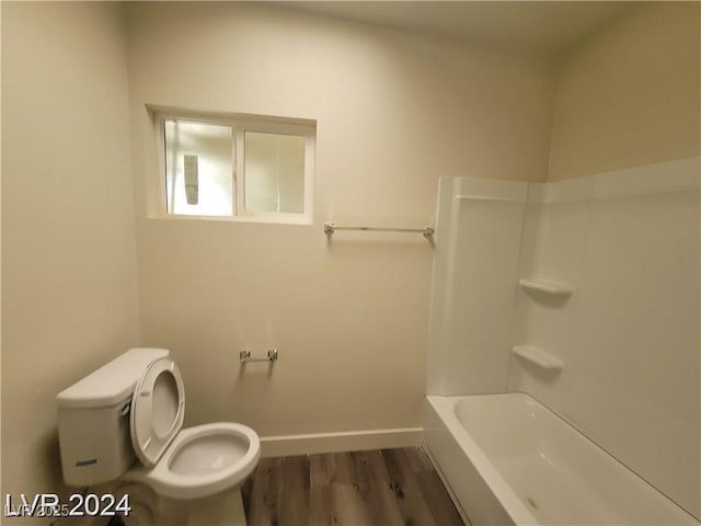 1317 Exley Ave, Las Vegas, NV 89104 - full bath with toilet, baseboards, and wood finished floors