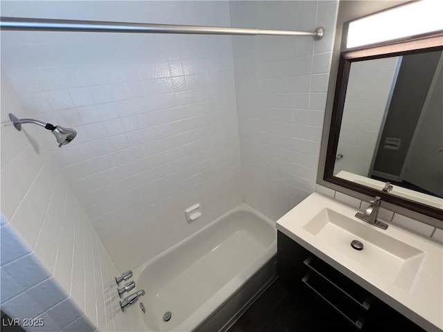 bathroom with vanity and shower / bathing tub combination