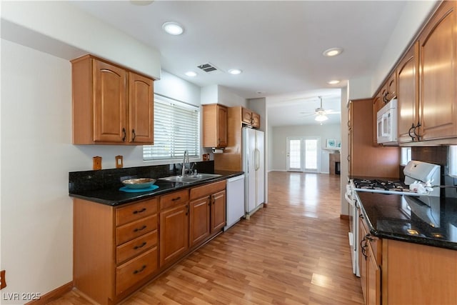 3510 Judah Way, Las Vegas, NV 89147 - kitchen with ceiling fan, visible vents, a sink, light wood-style floors, and white appliances