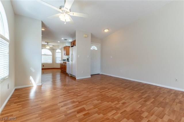 3510 Judah Way, Las Vegas, NV 89147 - unfurnished living room featuring baseboards, light wood finished floors, and ceiling fan