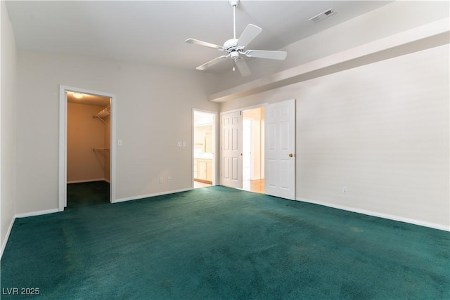 3510 Judah Way, Las Vegas, NV 89147 - unfurnished bedroom featuring baseboards, carpet flooring, and a walk in closet