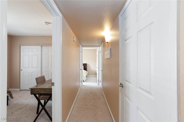 2120 Ramrod Ave Unit 513, Henderson, NV 89014 - corridor featuring light colored carpet and baseboards