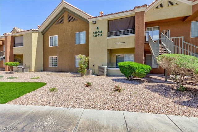 2120 Ramrod Ave Unit 513, Henderson, NV 89014 - view of property with central air condition unit and stairway