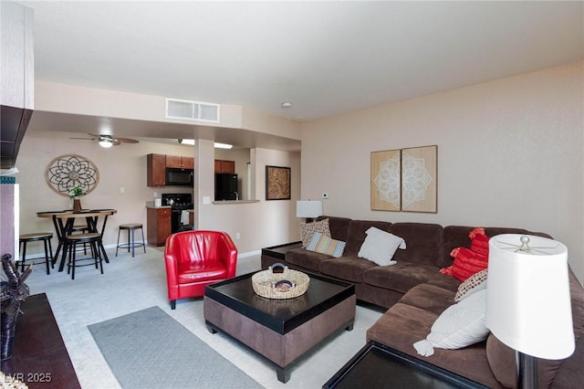 2120 Ramrod Ave Unit 513, Henderson, NV 89014 - living area with a ceiling fan and light carpet