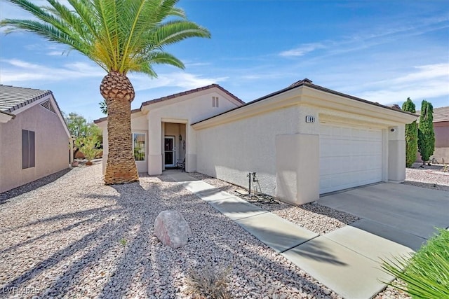 1991 High Mesa Dr, Henderson, NV 89012 - view of front of property with concrete driveway, a garage, and stucco siding