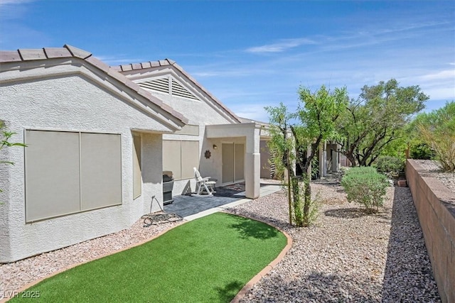 1991 High Mesa Dr, Henderson, NV 89012 - back of house featuring fence, stucco siding, and a patio area