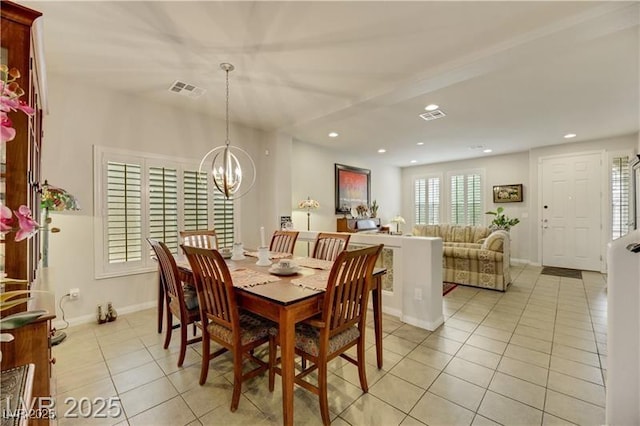 dining room with recessed lighting, an inviting chandelier, light tile patterned floors, and visible vents
