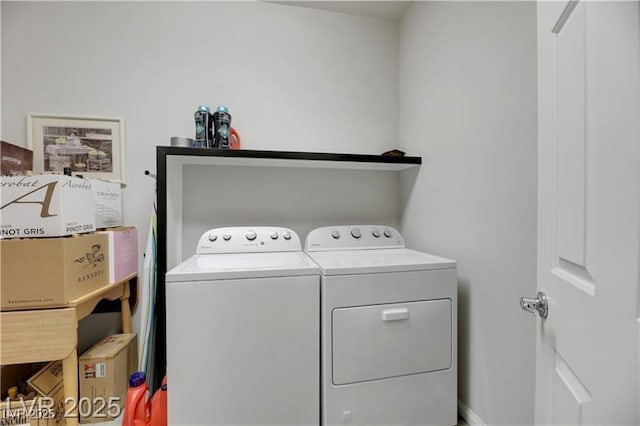 laundry room featuring laundry area and separate washer and dryer
