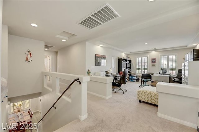 office area featuring visible vents, recessed lighting, baseboards, and light colored carpet