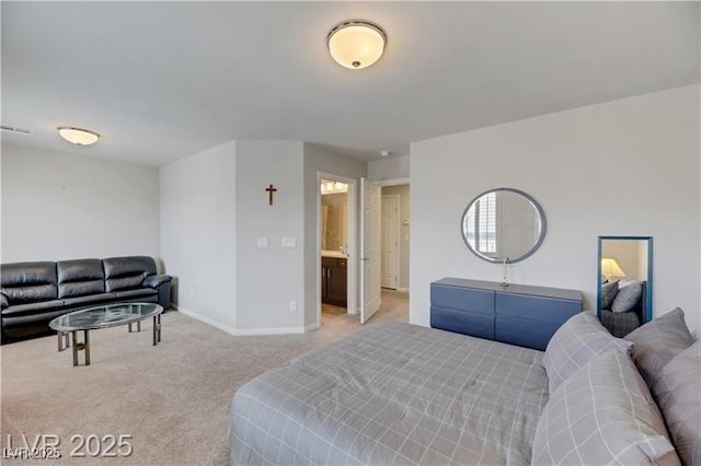 bedroom featuring baseboards, light carpet, and visible vents
