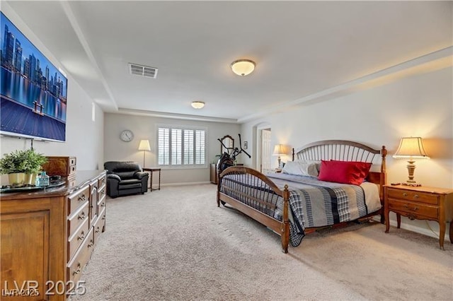 bedroom featuring baseboards, carpet, and visible vents