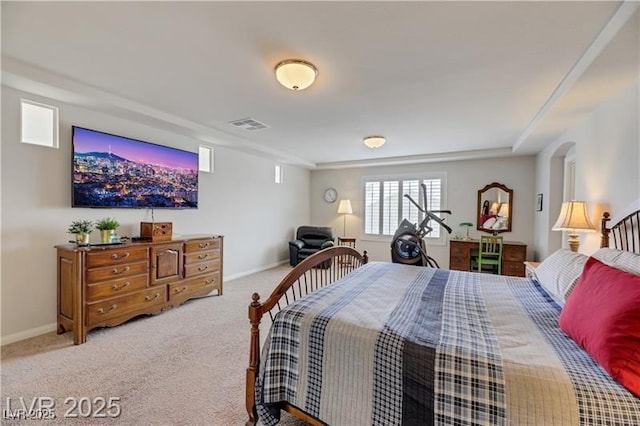 bedroom with visible vents, carpet flooring, and baseboards