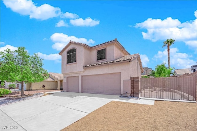 204 Appian Way, Henderson, NV 89002 - mediterranean / spanish-style house with an attached garage, a tile roof, stucco siding, a gate, and driveway