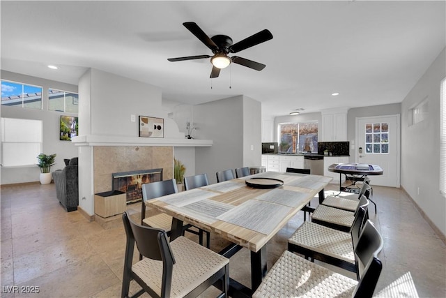 204 Appian Way, Henderson, NV 89002 - dining room featuring recessed lighting, baseboards, ceiling fan, and a fireplace