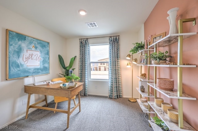 carpeted home office with baseboards and visible vents