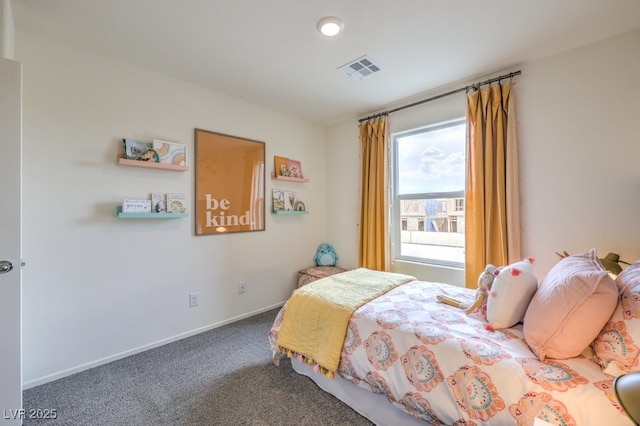 carpeted bedroom with baseboards and visible vents