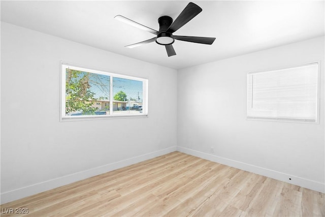 1020 Baker Ave, Las Vegas, NV 89108 - spare room featuring baseboards, ceiling fan, and wood finished floors