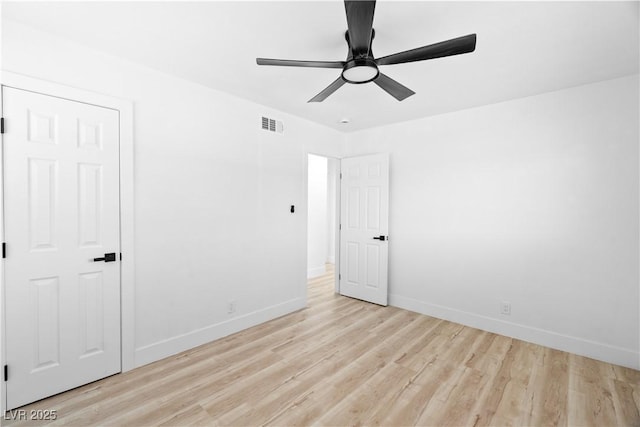 1020 Baker Ave, Las Vegas, NV 89108 - unfurnished bedroom featuring ceiling fan, baseboards, visible vents, and light wood-style flooring