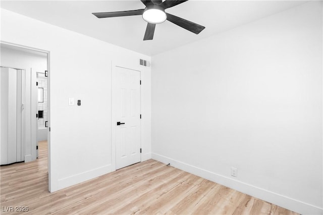 1020 Baker Ave, Las Vegas, NV 89108 - unfurnished bedroom featuring light wood-type flooring, a ceiling fan, and baseboards