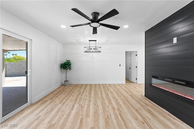 1020 Baker Ave, Las Vegas, NV 89108 - interior space featuring light wood finished floors, a large fireplace, recessed lighting, baseboards, and a ceiling fan