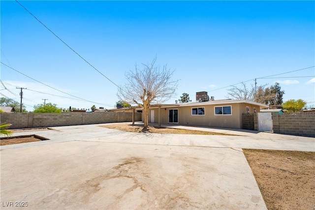 1020 Baker Ave, Las Vegas, NV 89108 - rear view of house featuring a fenced backyard and a patio