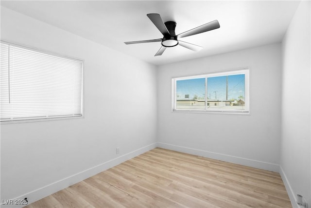 1020 Baker Ave, Las Vegas, NV 89108 - unfurnished room with baseboards, light wood-style floors, and ceiling fan