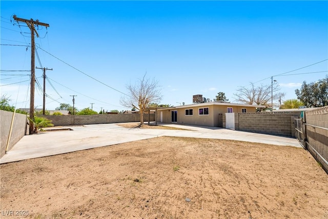 1020 Baker Ave, Las Vegas, NV 89108 - view of yard with a fenced backyard and a patio