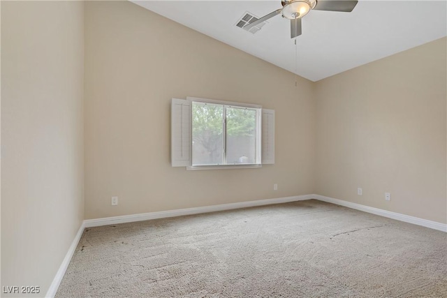 unfurnished room featuring a ceiling fan, visible vents, baseboards, lofted ceiling, and carpet flooring