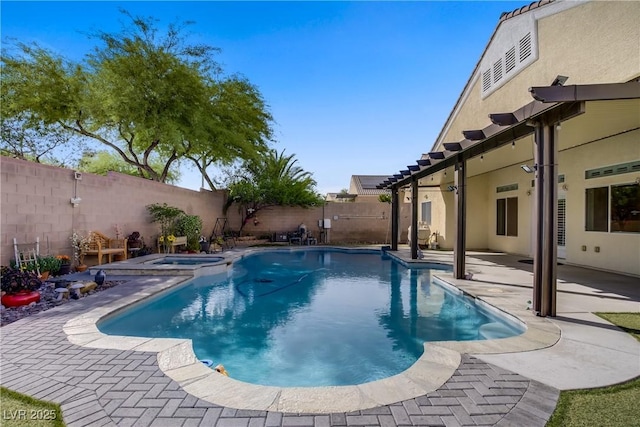 view of swimming pool with a pool with connected hot tub, a fenced backyard, and a patio area