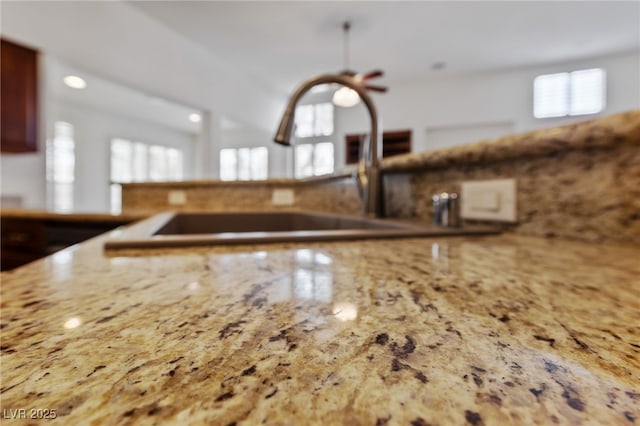 4217 Box Canyon Falls Ave, North Las Vegas, NV 89085 - room details featuring light stone counters and a sink