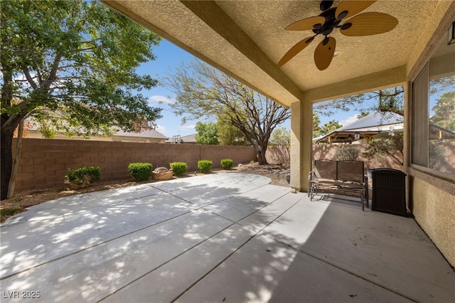 4217 Box Canyon Falls Ave, North Las Vegas, NV 89085 - view of patio / terrace with a ceiling fan and a fenced backyard
