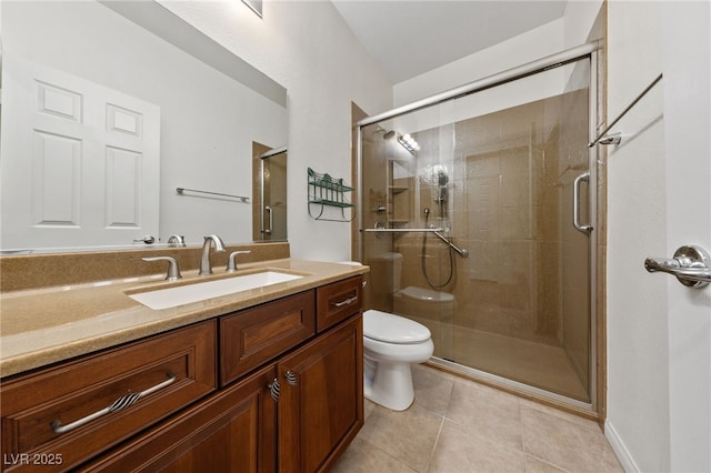 4217 Box Canyon Falls Ave, North Las Vegas, NV 89085 - bathroom with toilet, tile patterned floors, a shower stall, and vanity