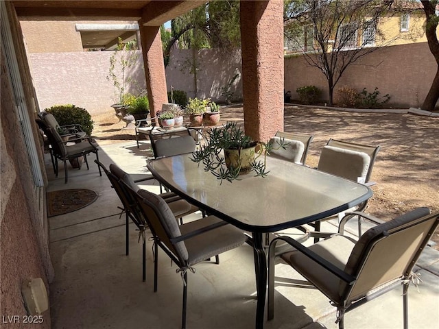 view of patio / terrace with outdoor dining area and a fenced backyard