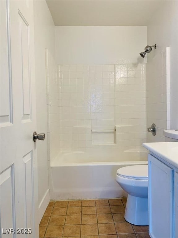 full bathroom featuring toilet, shower / washtub combination, tile patterned flooring, and vanity