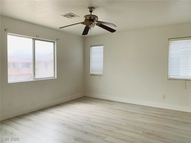 10238 Missouri Meadows St, Las Vegas, NV 89183 - unfurnished room with baseboards, ceiling fan, light wood-type flooring, and visible vents