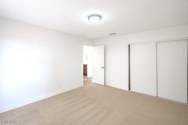 10009 Coral Sands Dr, Las Vegas, NV 89117 - unfurnished bedroom featuring carpet flooring, baseboards, visible vents, and a closet